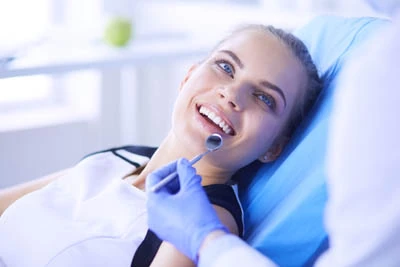woman receiving dental care at the office of Gina Biedermann DDS in Keller, TX